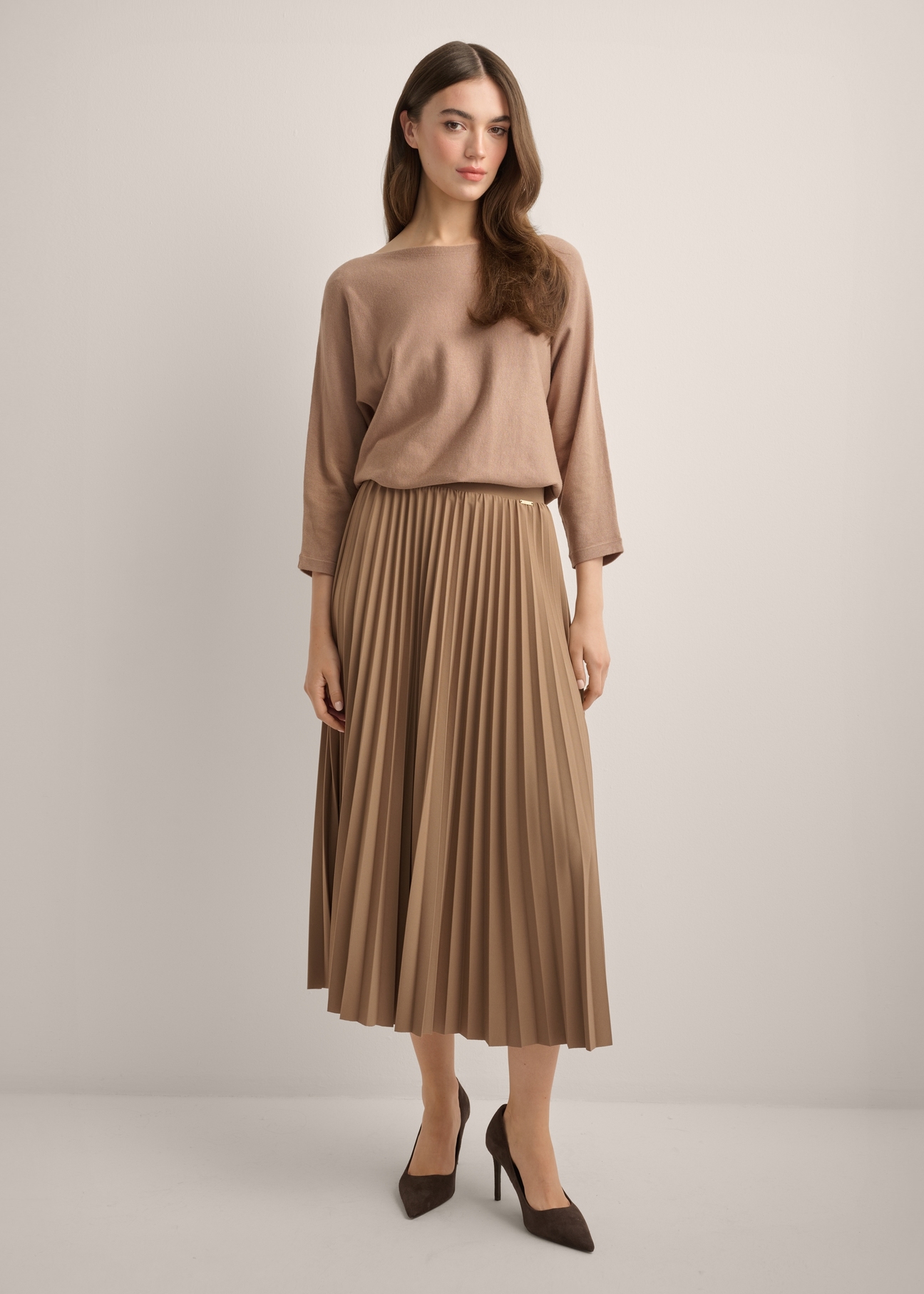 Camel Pleated Midi Skirt SPCDT-0096-1D(Z26), front view of the product on the model. Full silhouette visible.