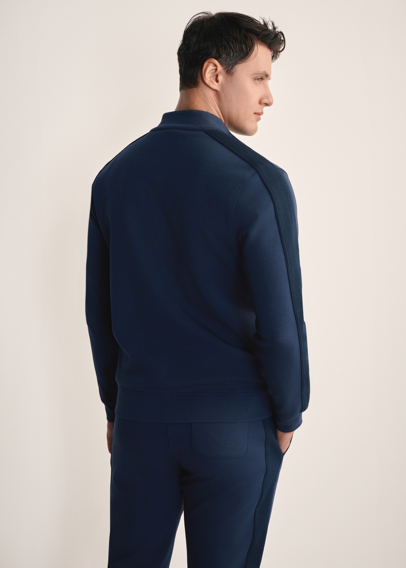 Navy blue men's sweatshirt BLZMT-0075-68(Z25), back view of the product on the model. Half of the silhouette visible.