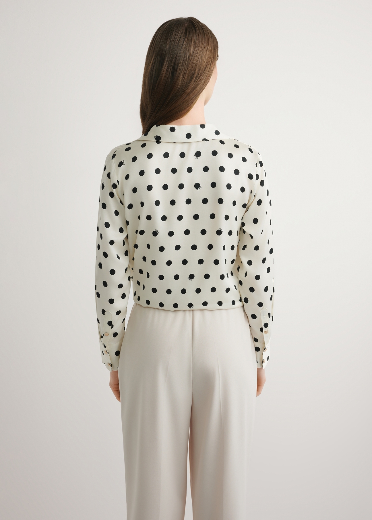 Women's cream polka dot shirt KOSDT-0155-0P(W26), back view of the product on the model. Half of the silhouette visible.