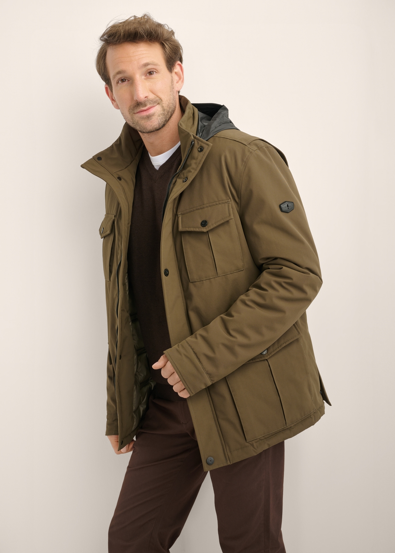 Men's transitional khaki jacket KURMT-0437-8D(Z26), side view of the product on the model. Half of the silhouette visible.