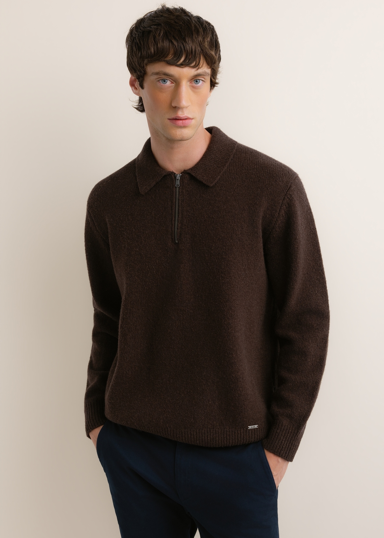 Dark brown men's wool sweater SWEMT-0212-1I(Z26), front view of the product on the model. Half of the silhouette visible.