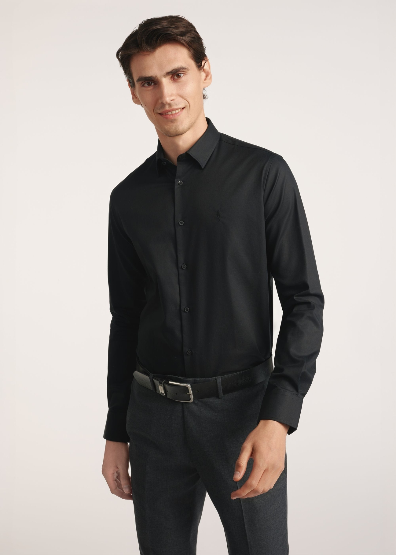Black men's shirt KOSMT-0351A-99(Z26) - front view of the product on a model on a white background. Half of the silhouette visible.