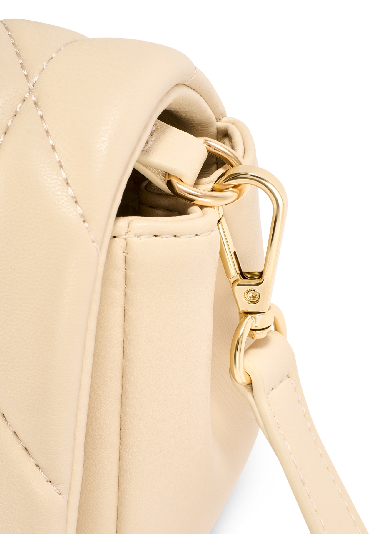 Cream women's handbag with stitching TOREC-1151-0B(W26) - close-up of detail, on white background.