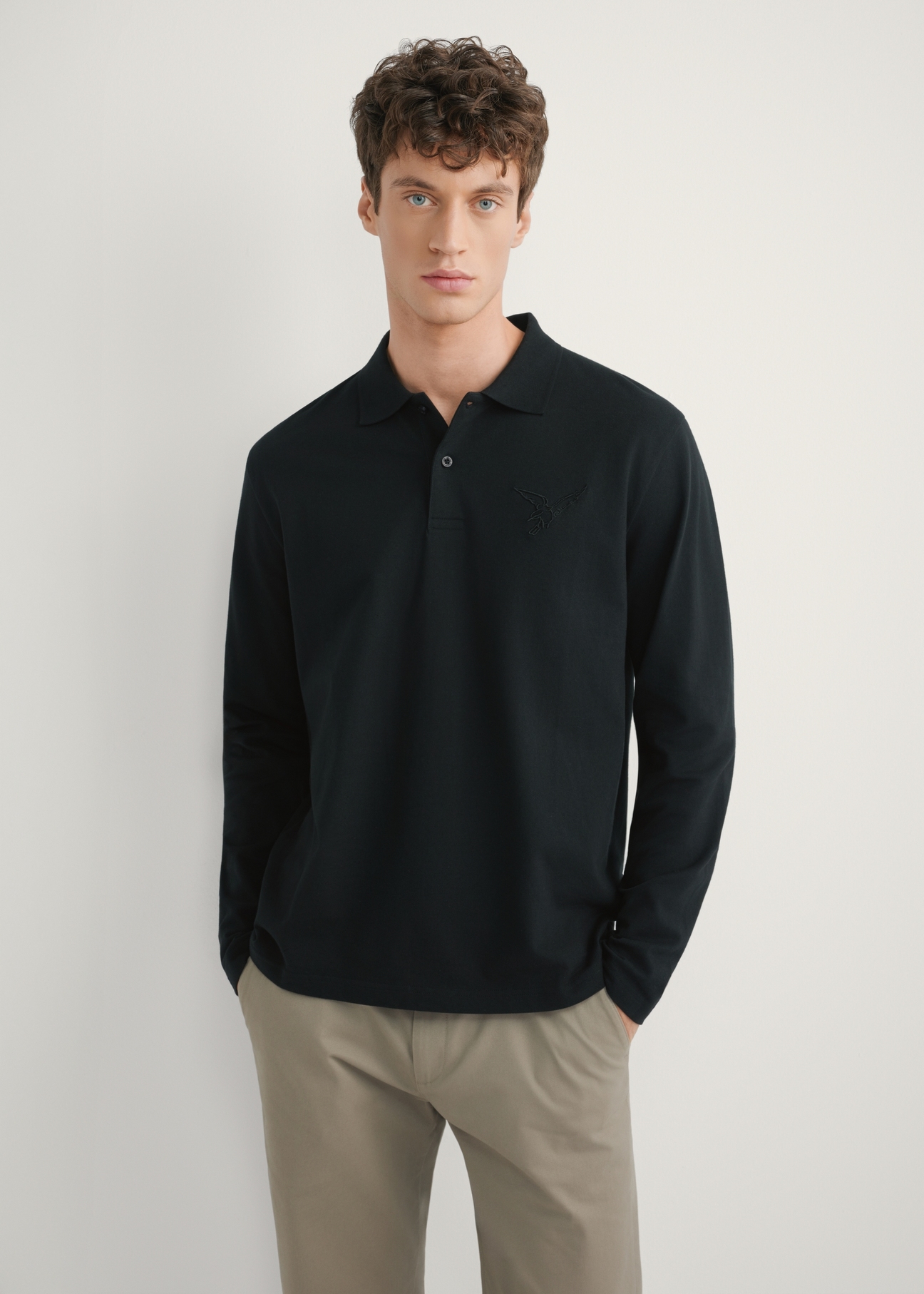 Men's black longsleeve with collar LSLMT-0011-99(W26), front view of the product on the model. Half of the silhouette visible.