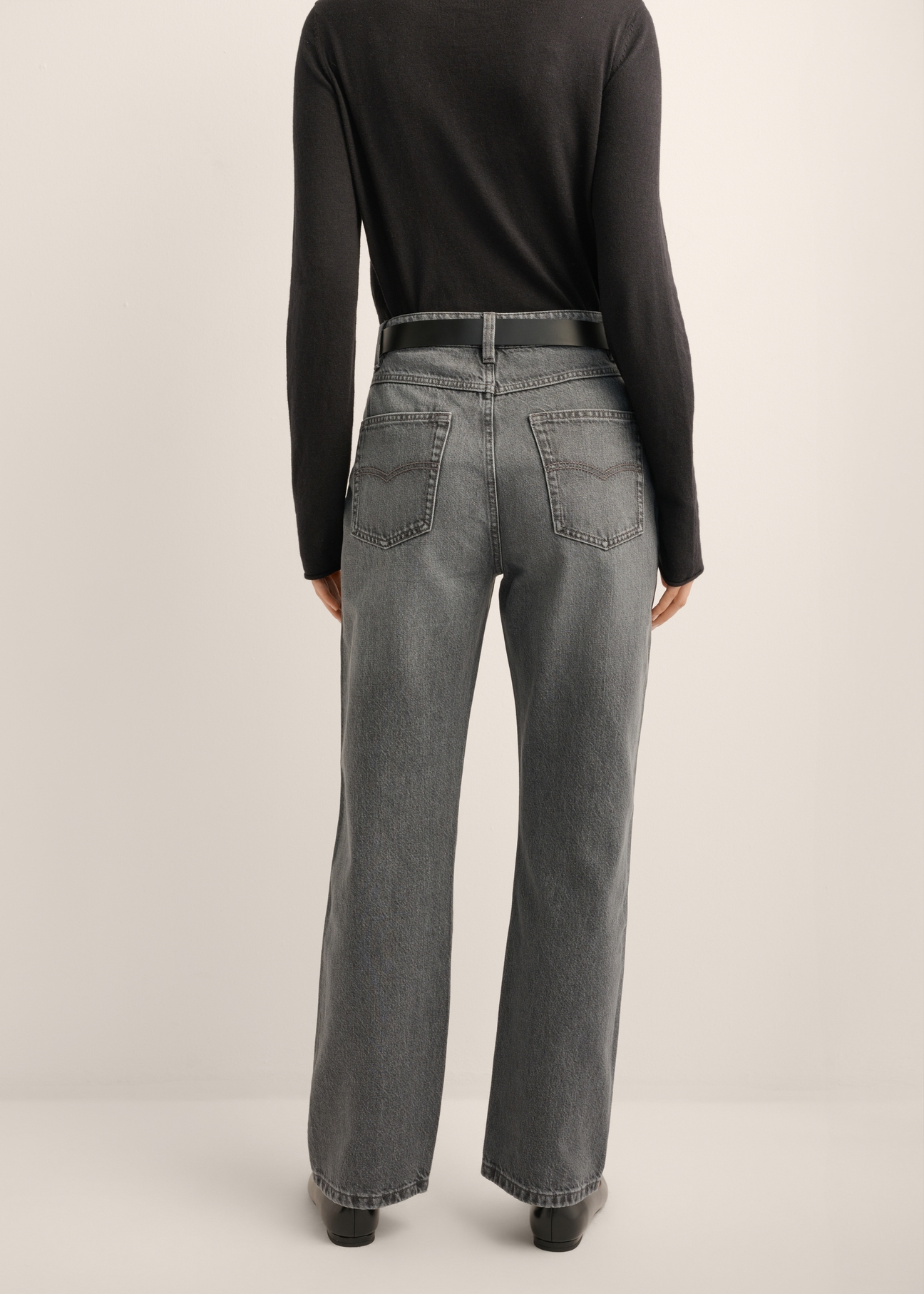 Gray women's jeans JEADT-0016-9B(Z26), product view from the back on the model, half of the silhouette visible.