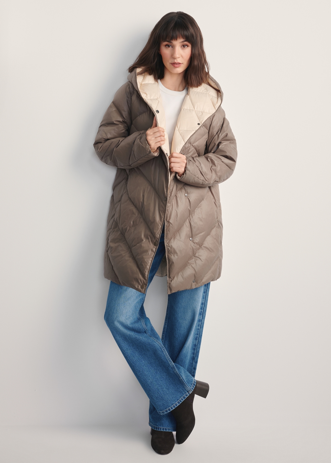 Women's olive quilted jacket KURDT-0595-57(Z25), front view of the product on the model. Full body visible.