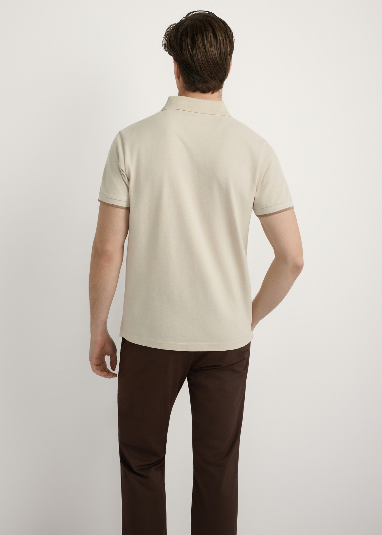 Light beige cotton polo shirt POLMT-0045B-1A(W26), back view of the product on the model. Half of the silhouette visible.