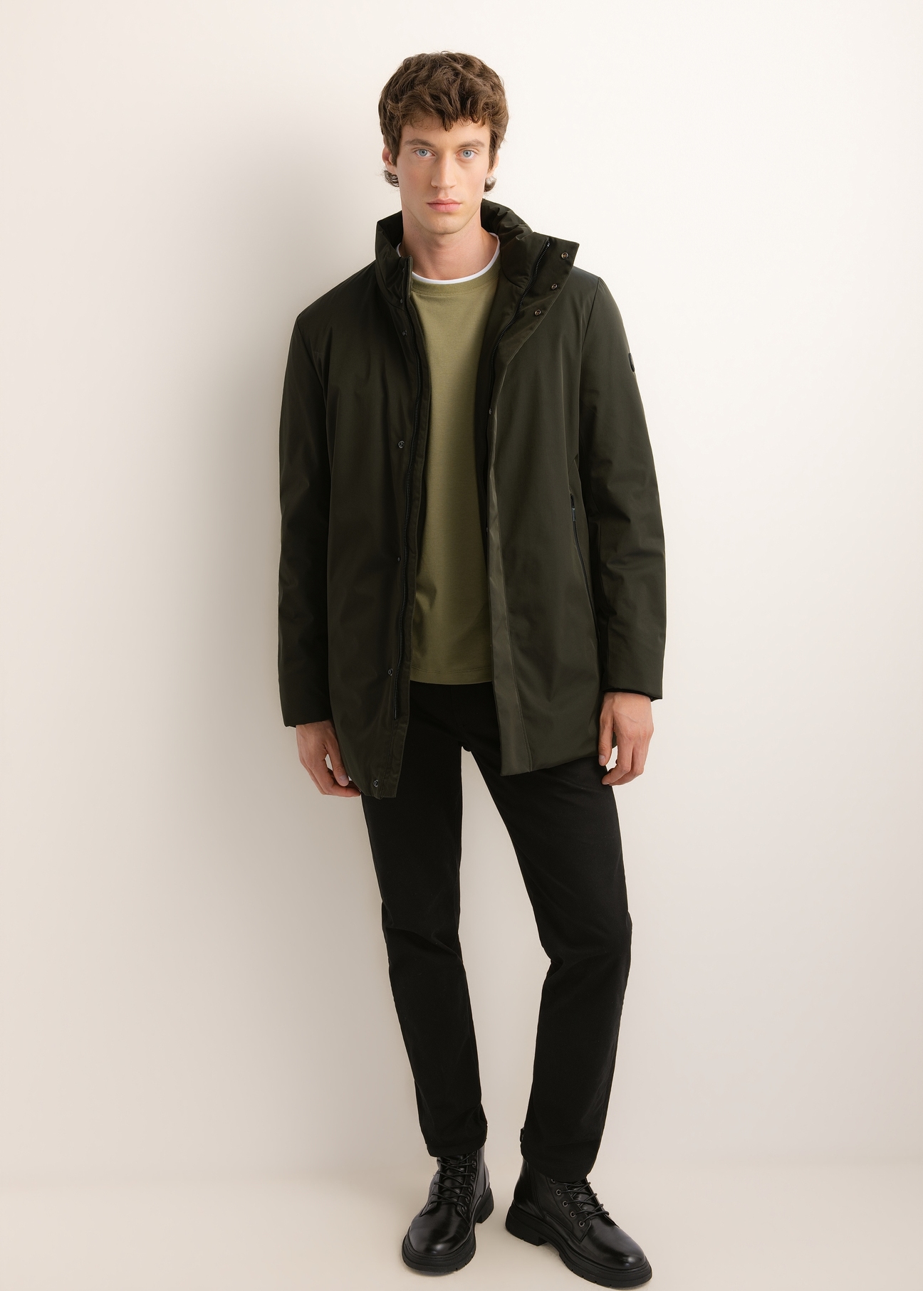 Green men's long winter jacket KURMT-0432-8B(Z26), front product view on model. Full body visible.