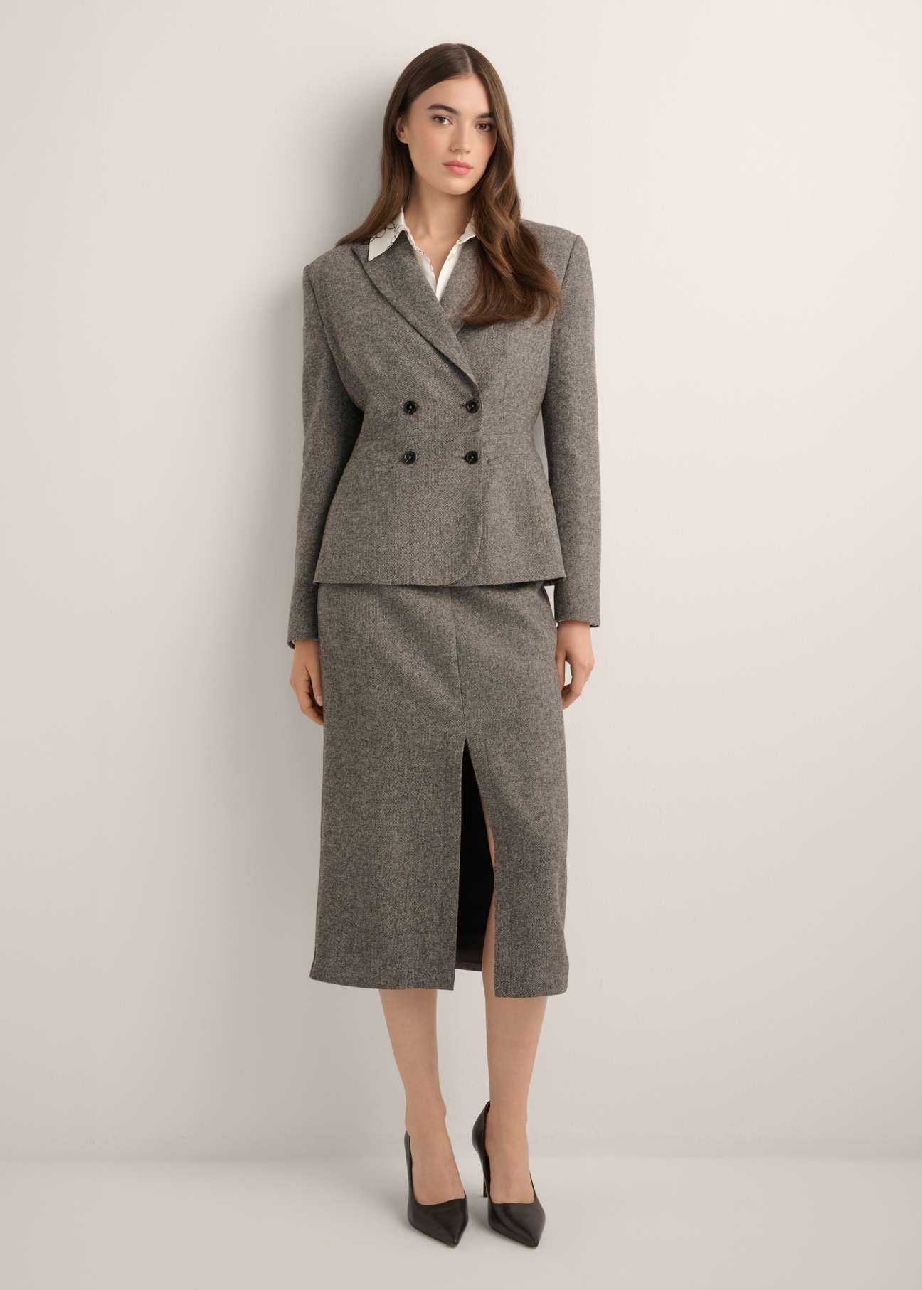 Gray wool midi skirt SPCDT-0133-9D(Z26), product view from the front on the model, the whole silhouette is visible.