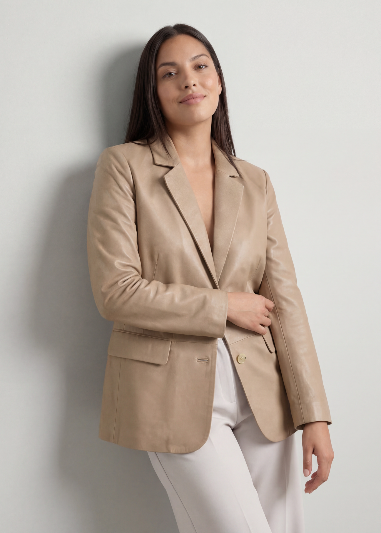 Beige women's PLUS SIZE leather jacket KURDS-0645L-1B(W26), diagonal view of the product on the model, half of the silhouette visible.