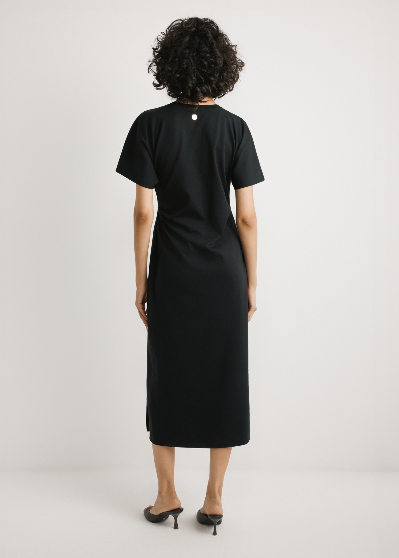 Black cotton midi dress SUKDT-0273-99(W26) - product view from the back, on a white background.
