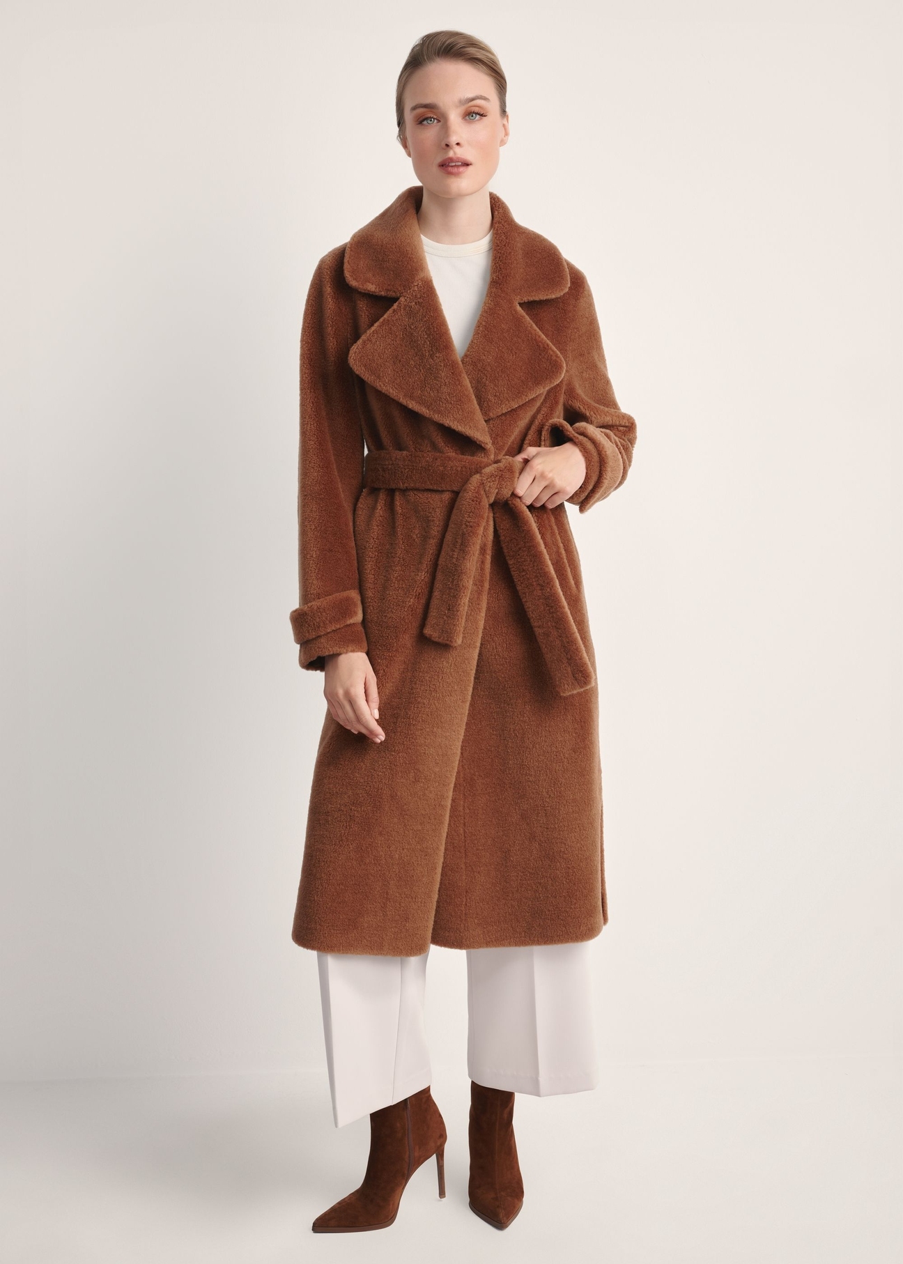 Long woolen fur coat in camel color FUTDW-0019A-1D(Z26) - front view of the product on a model on a white background. The entire silhouette is visible.