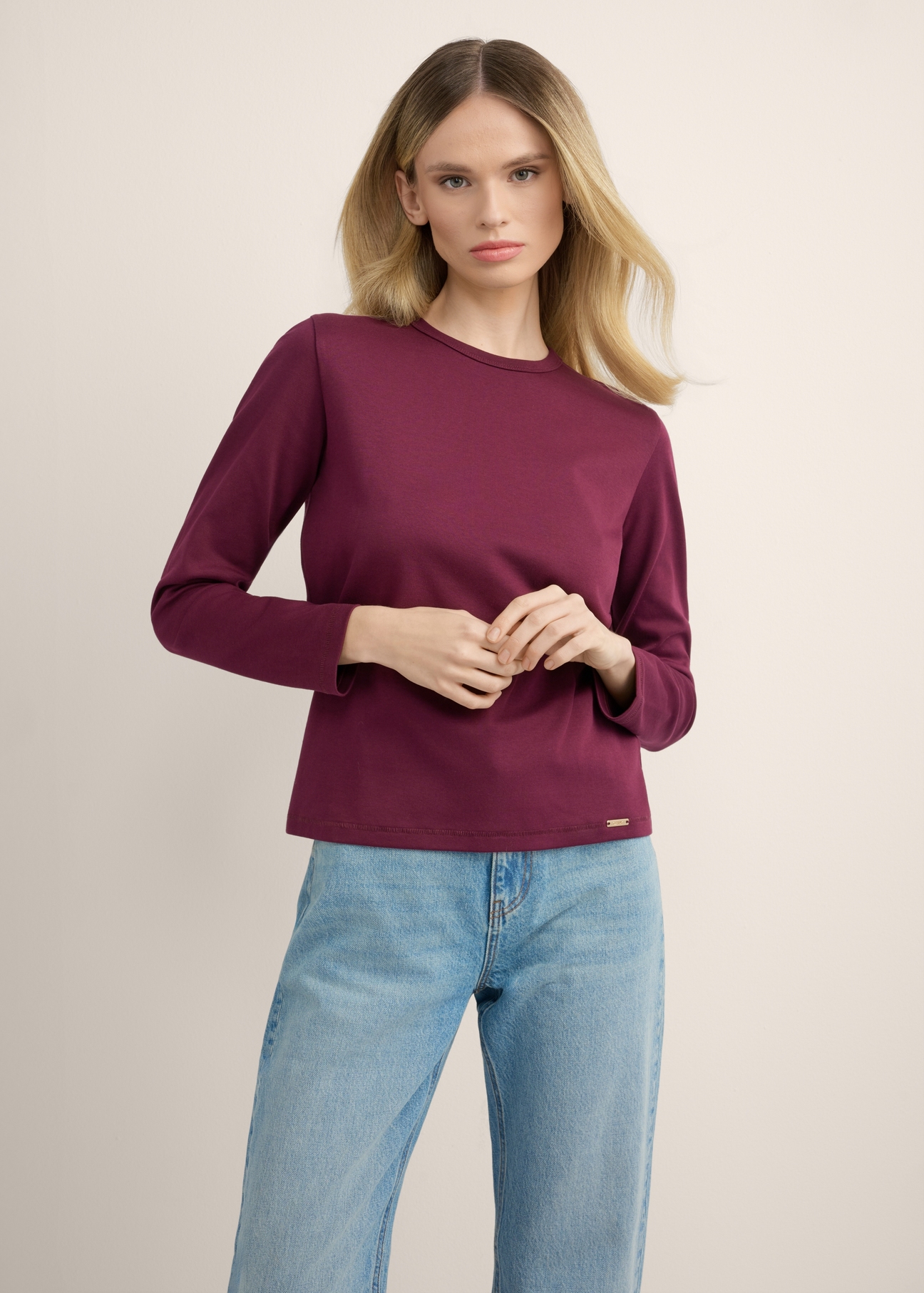 Women's burgundy cotton longsleeve LSLDT-0052-4D(Z26), front view of the product on the model. Half of the silhouette visible.