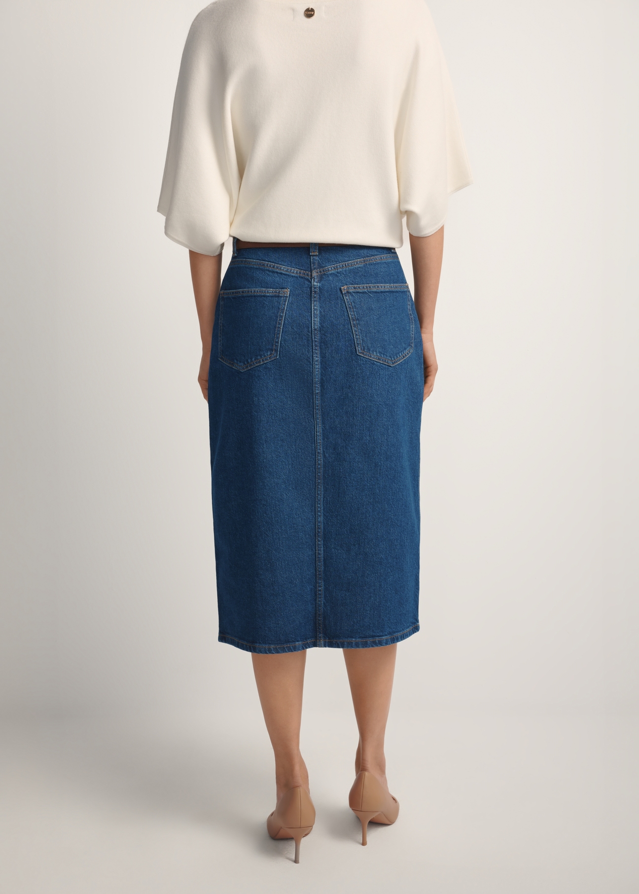Denim midi skirt SPCDT-0119-7H(W26), back view of the product on the model. Half of the silhouette visible.