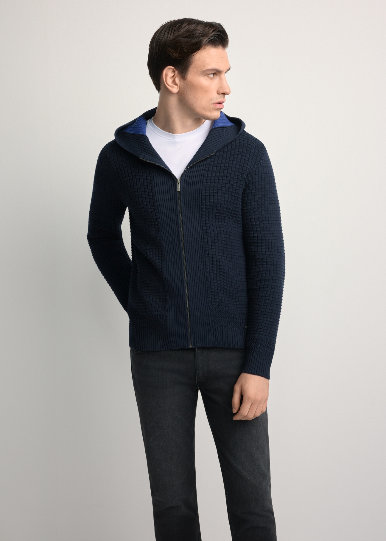 Men's navy blue hooded sweater SWEMT-0182-68(Z25), front product view on model. Half of the silhouette visible.