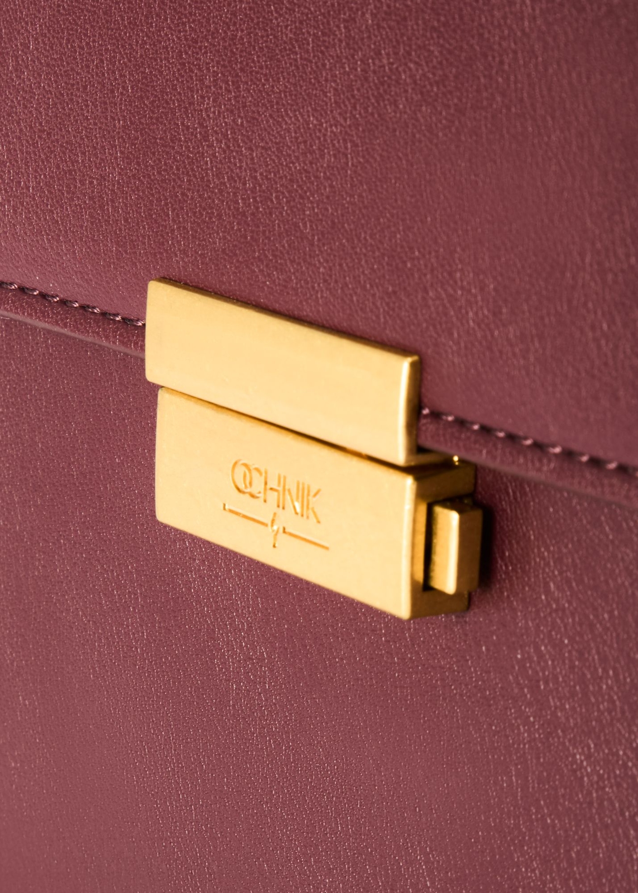 Burgundy women's trunk handbag TOREC-1080-49(Z25) - close-up of detail, on white background.