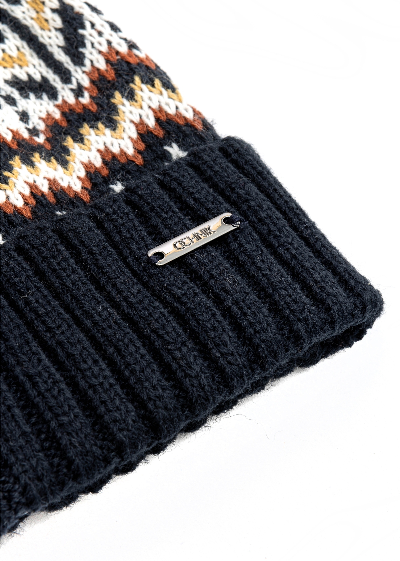 Men's winter hat with Norwegian pattern CZAMT-0068-69(Z25), close-up of the product detail, view on a white background.