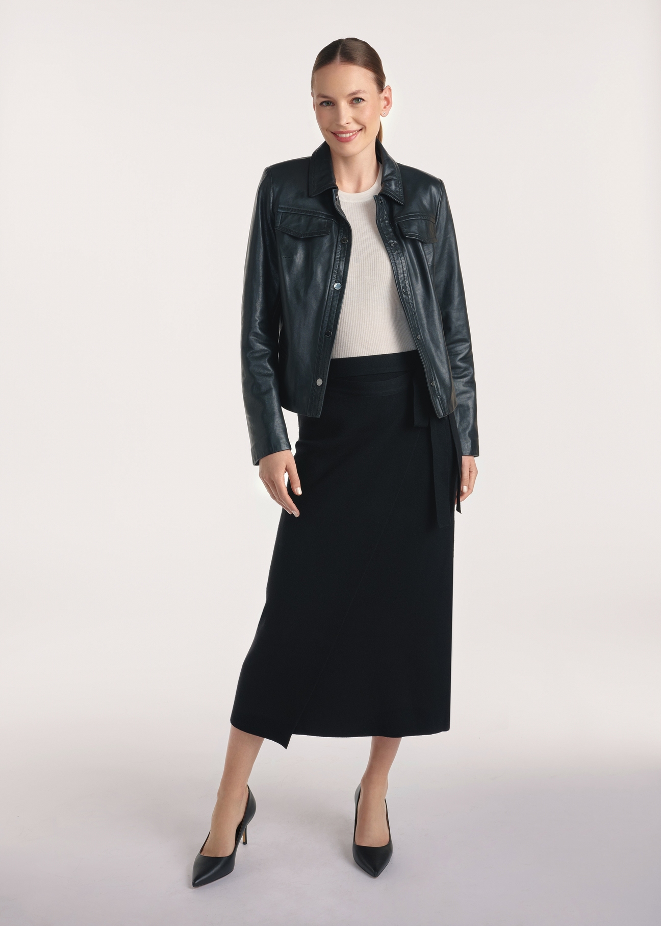 Black women's leather jacket KURDS-0548-2874(Z25), front product view on the model, full silhouette visible.