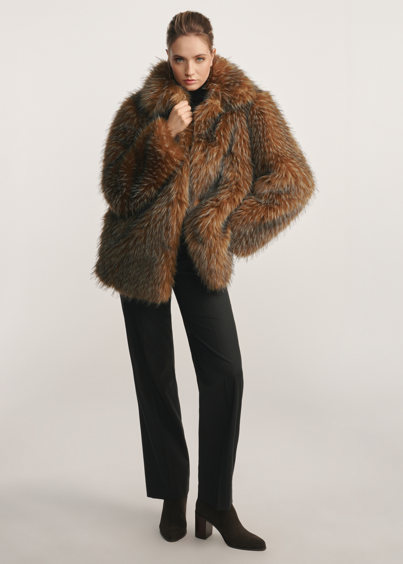 Brown women's fur coat FUTDP-0059-15(Z25), front view of the product on the model. The whole silhouette is visible.