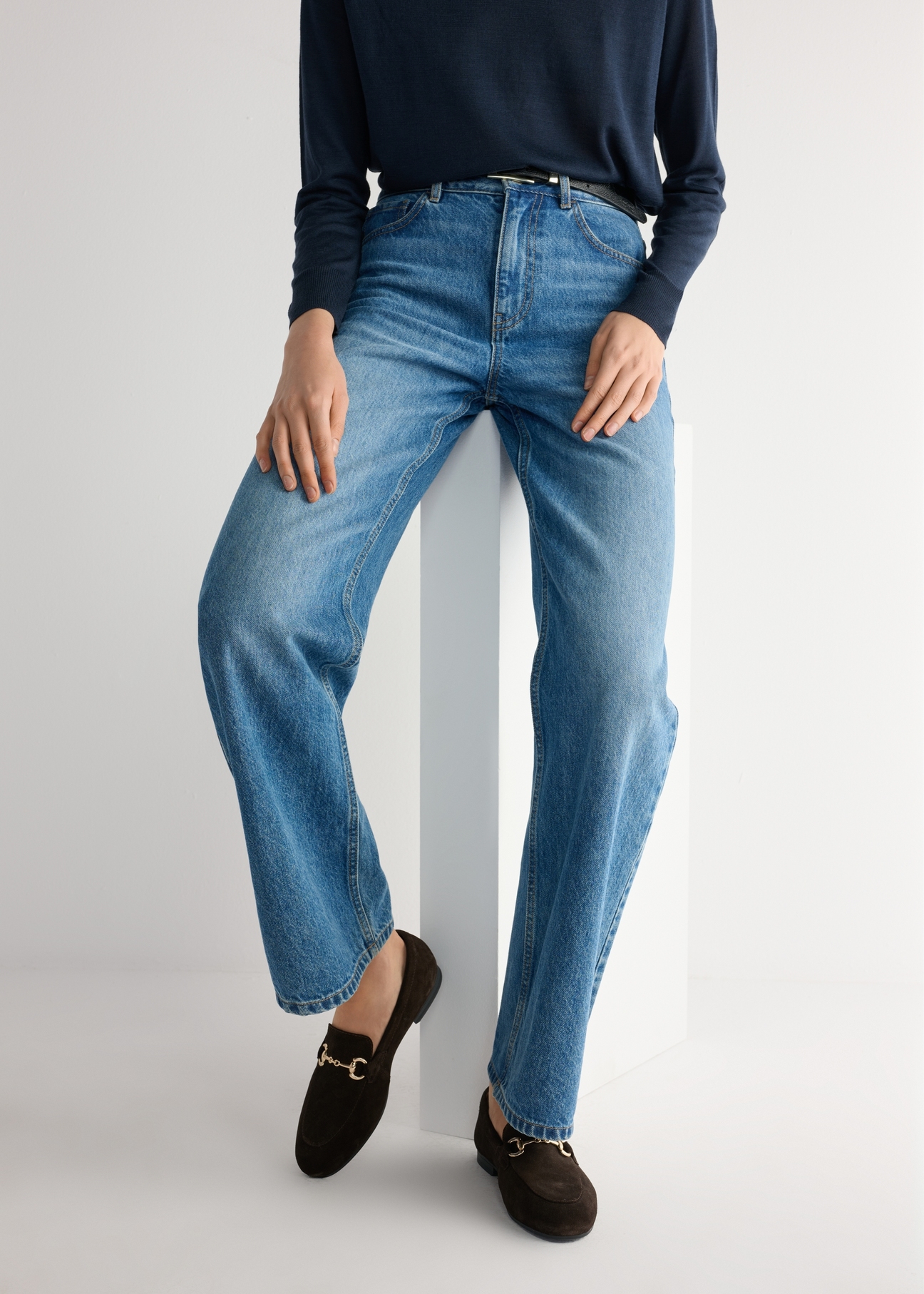 Women's brown suede moccasins BUTYD-1257-1I(W26), product view on model's feet against a light background.