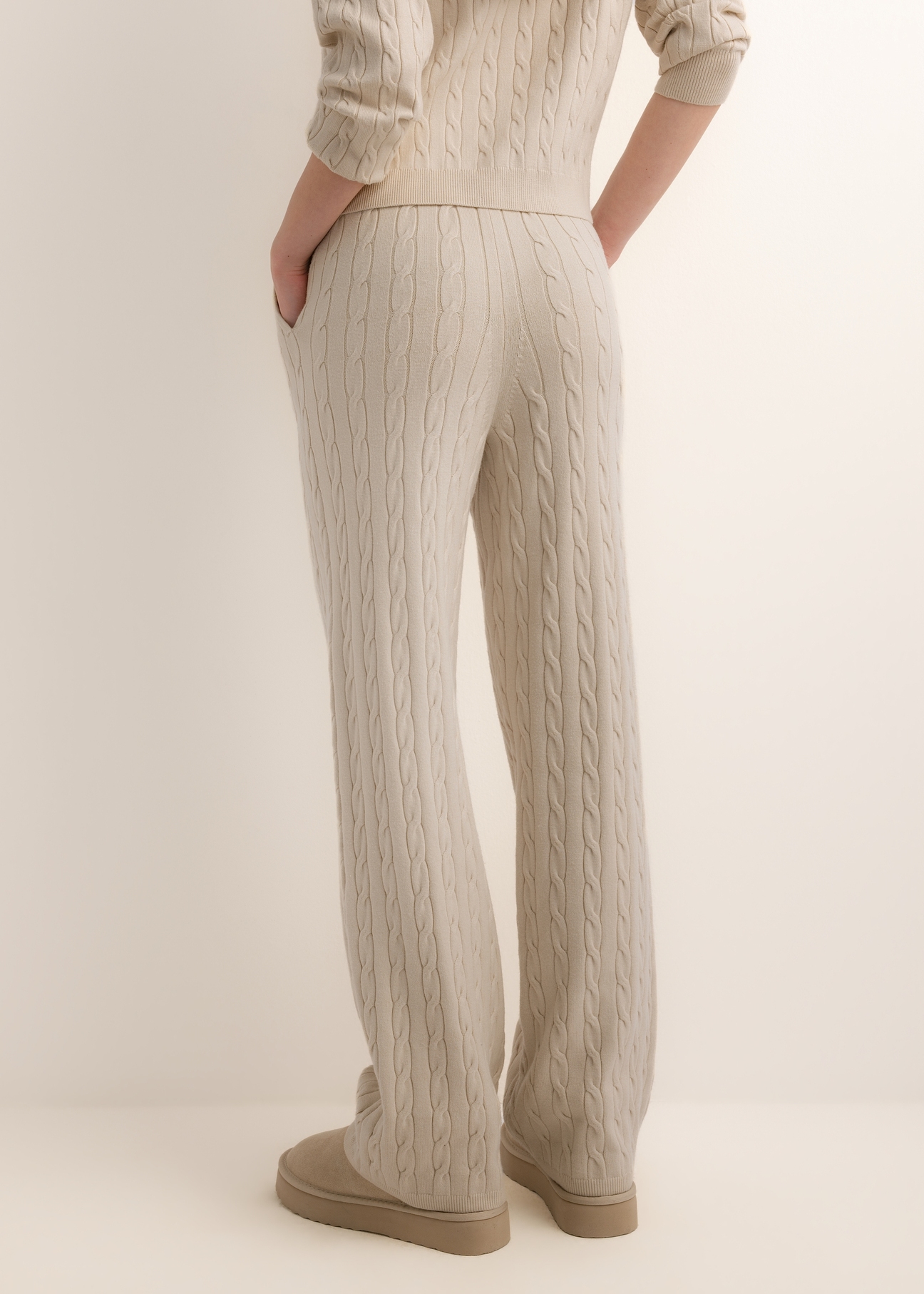 Light beige women's trousers SPODT-0131-1A(Z26), rear view on a model. Half-body shot.
