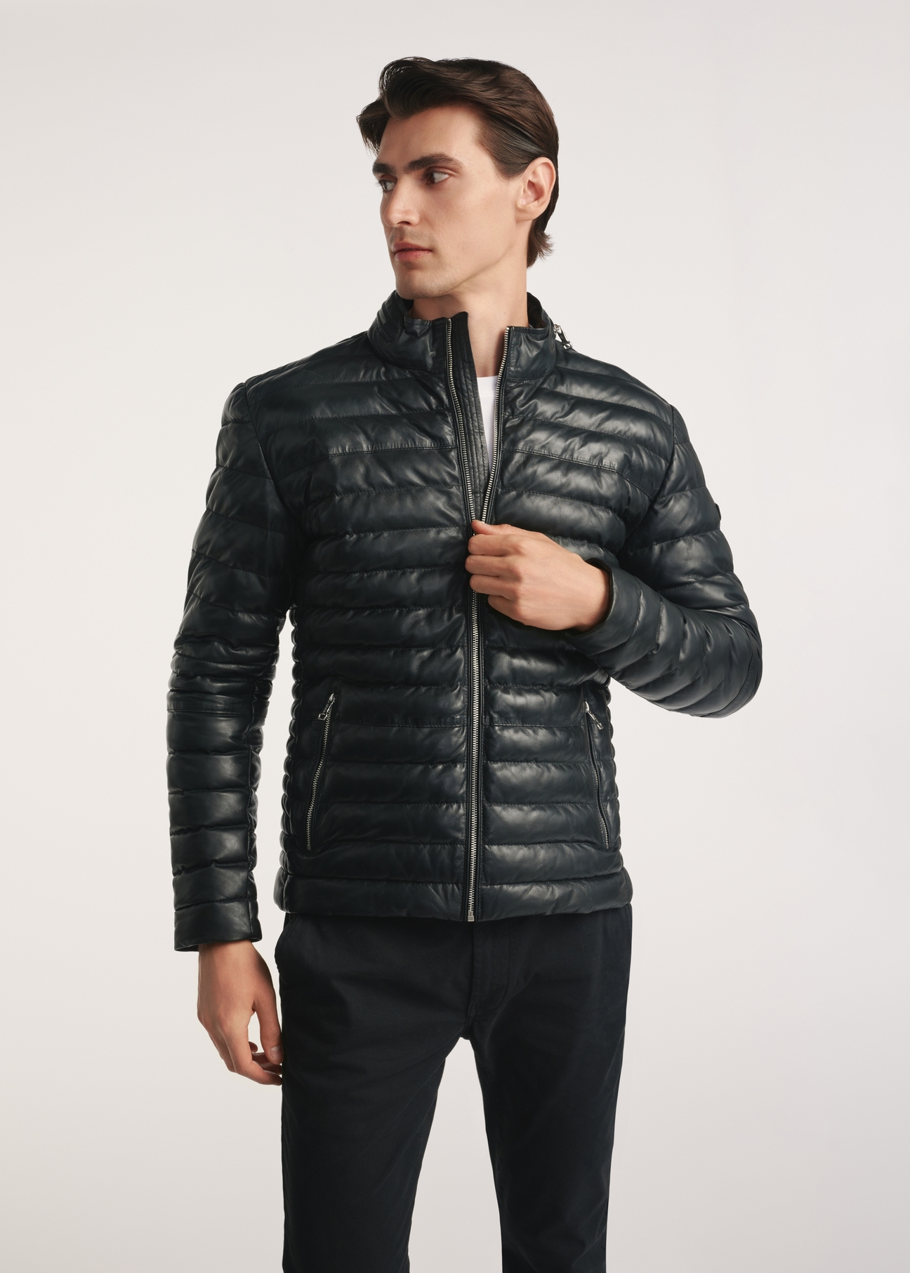 Black men's leather jacket insulated KURMS-0379-3358(Z25), product visible from the back on the model, half of the silhouette visible.-02
