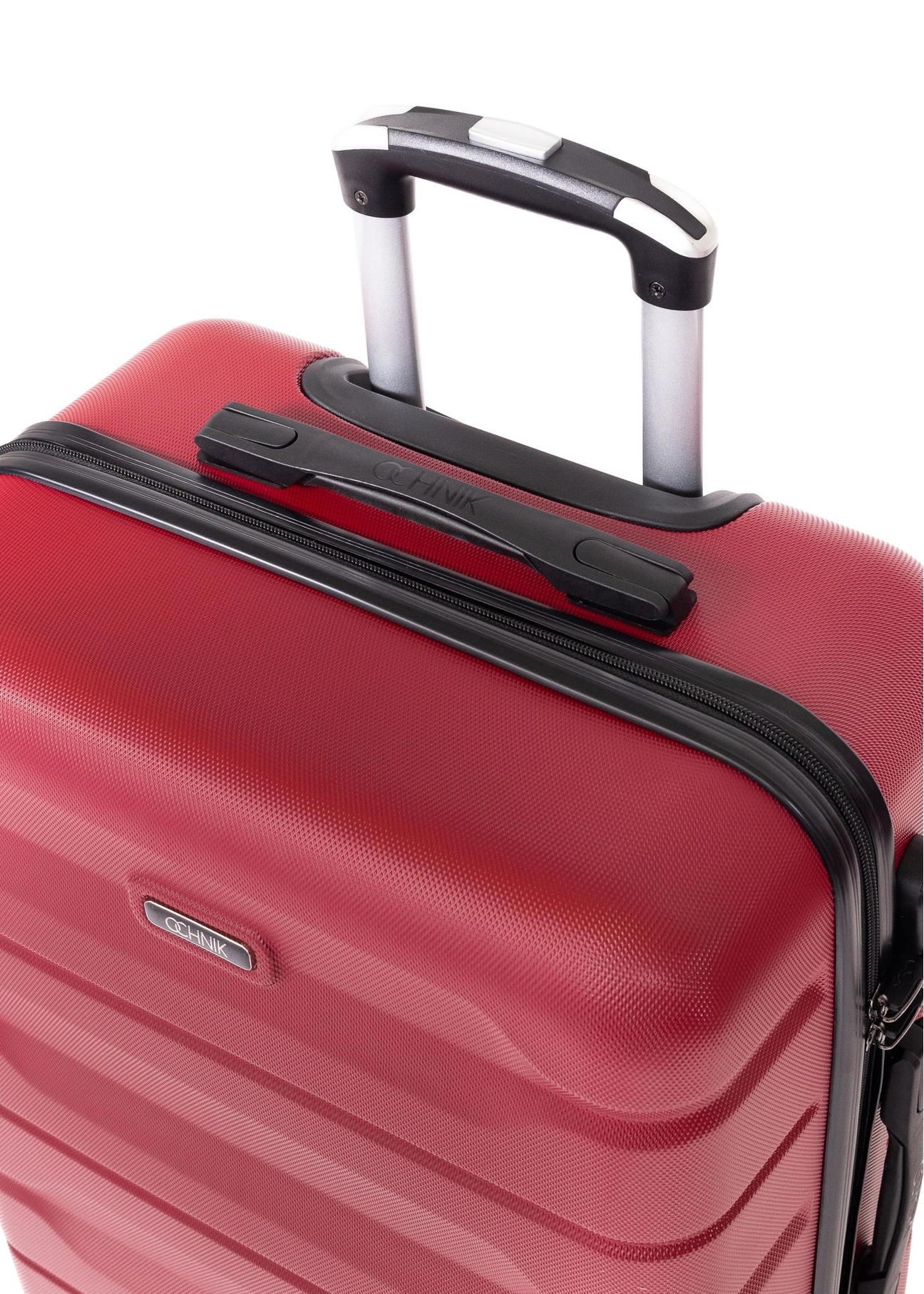 Medium suitcase on wheels WALAB-0067-4D-24(W26), view of the product handle on a white background.
