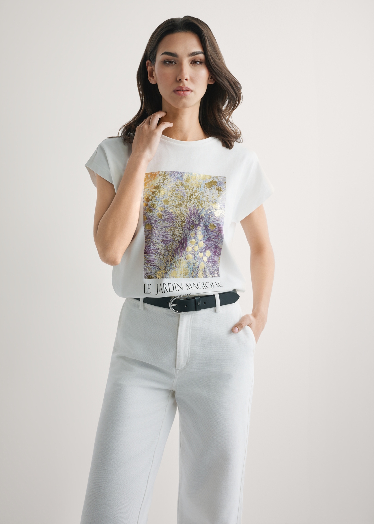 Cream women's T-shirt with print TSHDT-0160-0B(W26), front view of the product on the model. Half of the silhouette visible.