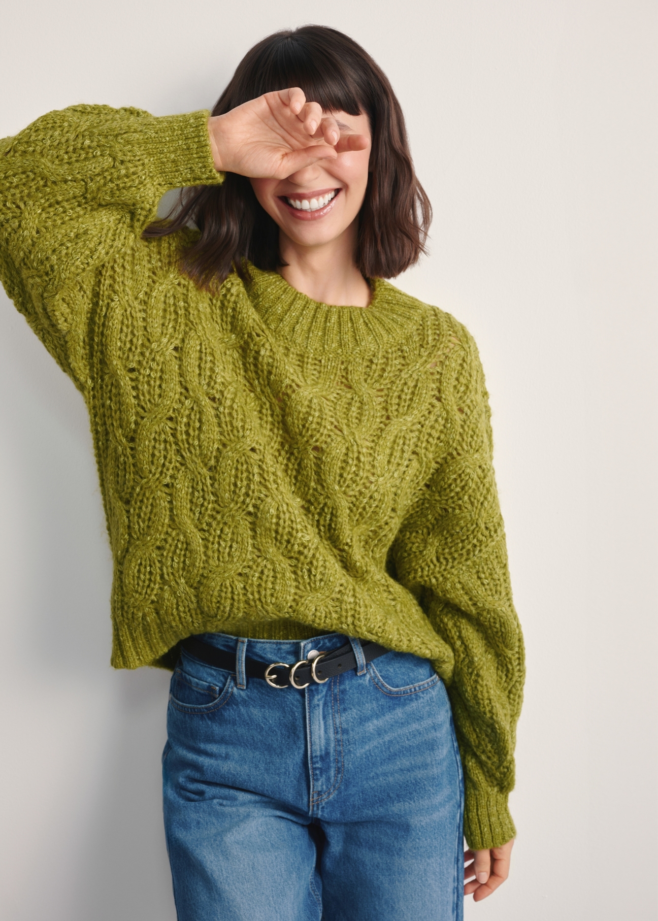 Women's lime green sweater SWEDT-0236-84(Z25), front view of the product on the model. Half of the silhouette visible.