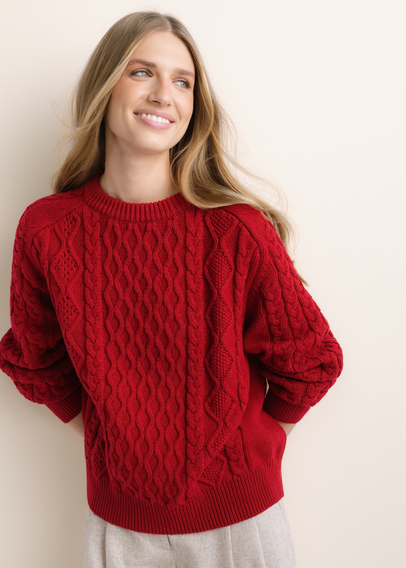 Dark red women's sweater SWEDT-0277-4C(Z26), front view of the product on the model. Half of the silhouette visible.