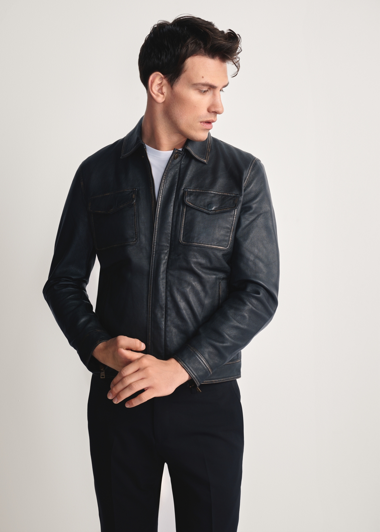 Black men's vintage leather jacket KURMS-0381-2870(Z25), product view from the front on the model, half silhouette visible.-02