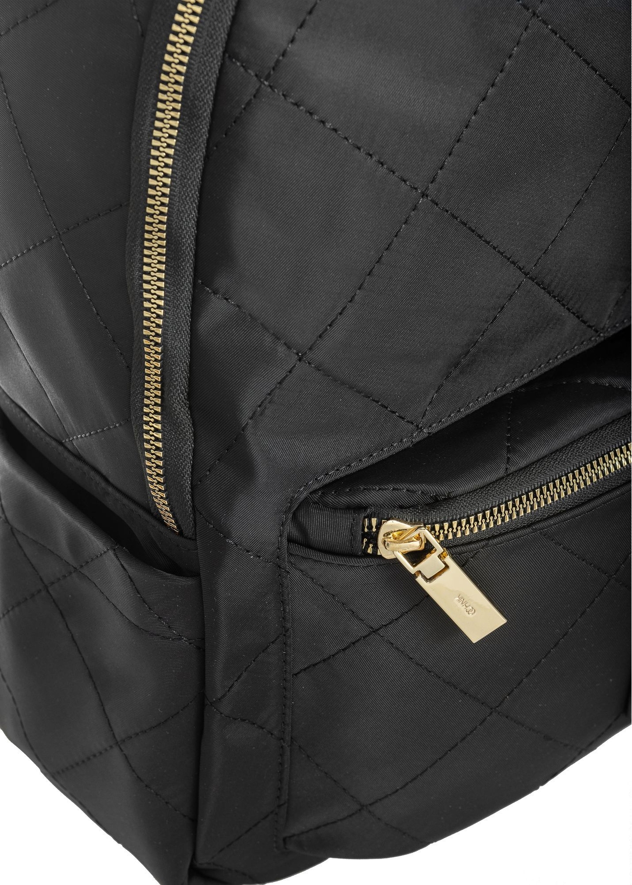 Black quilted women's backpack TOREN-0265A-99(Z25) - close-up of the detail on a white background.