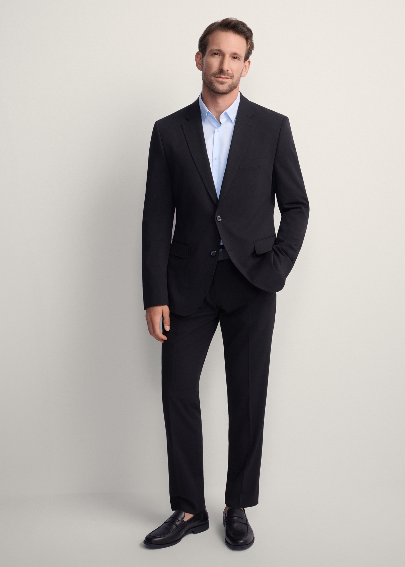 Black men's jacket MARMT-0019-99(Z25), front view of the product on the model, the entire silhouette is visible.