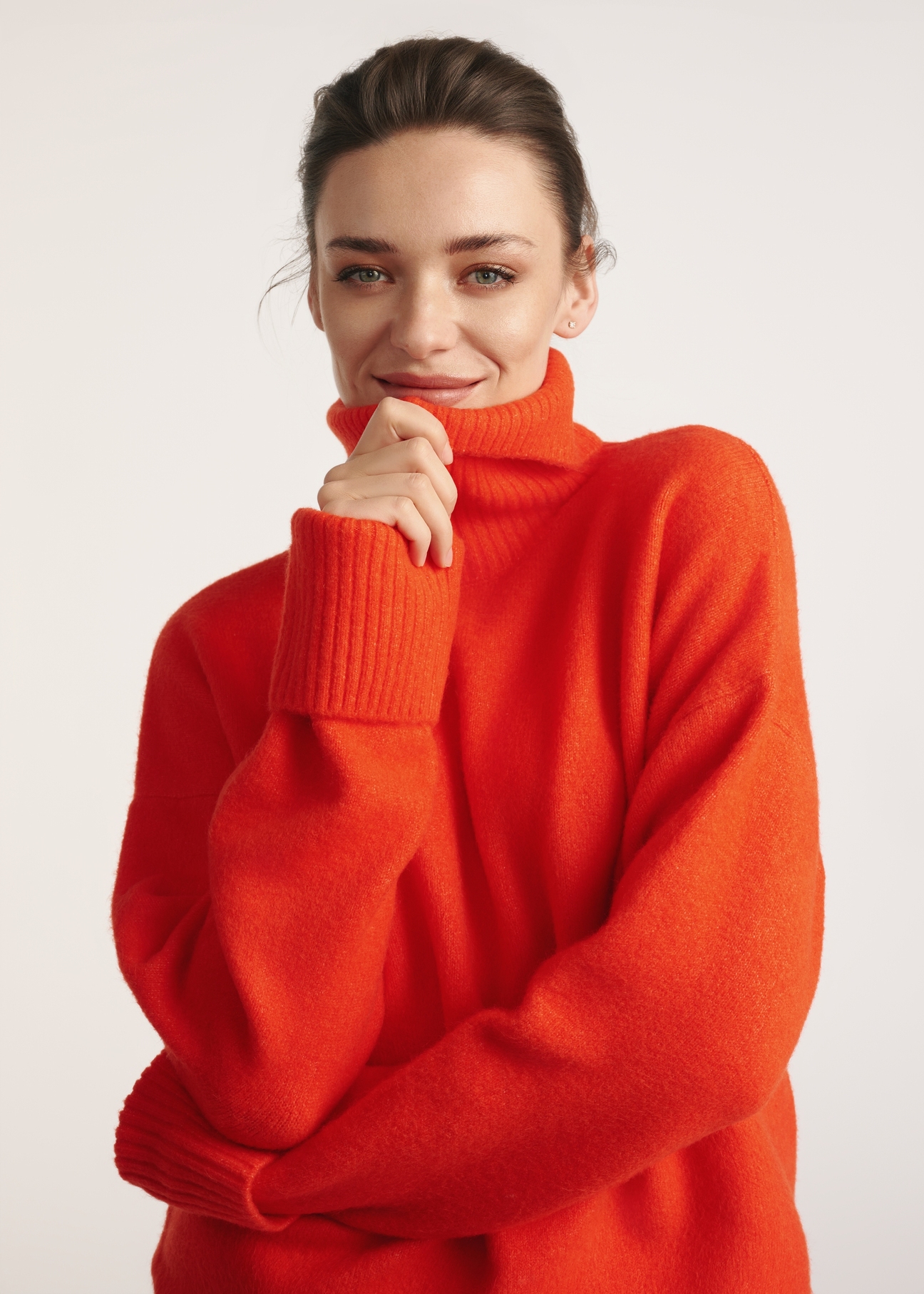 Orange women's turtleneck SWEDT-0249-30(Z25), front view of the product on the model. Half of the silhouette visible.