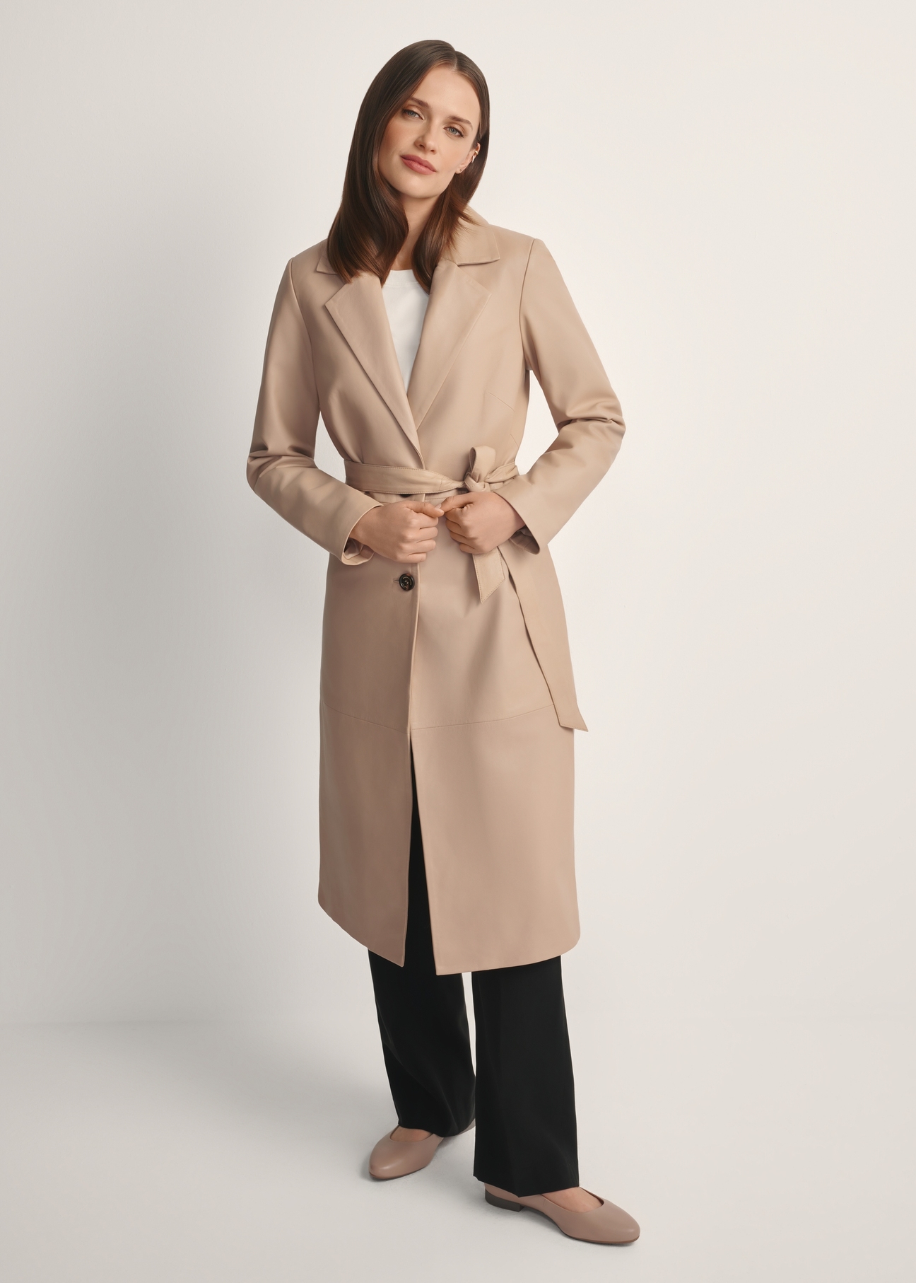 Beige women's leather coat KURDS-0613-1B(W26) - front view of a model against a light background. Full-length silhouette visible.