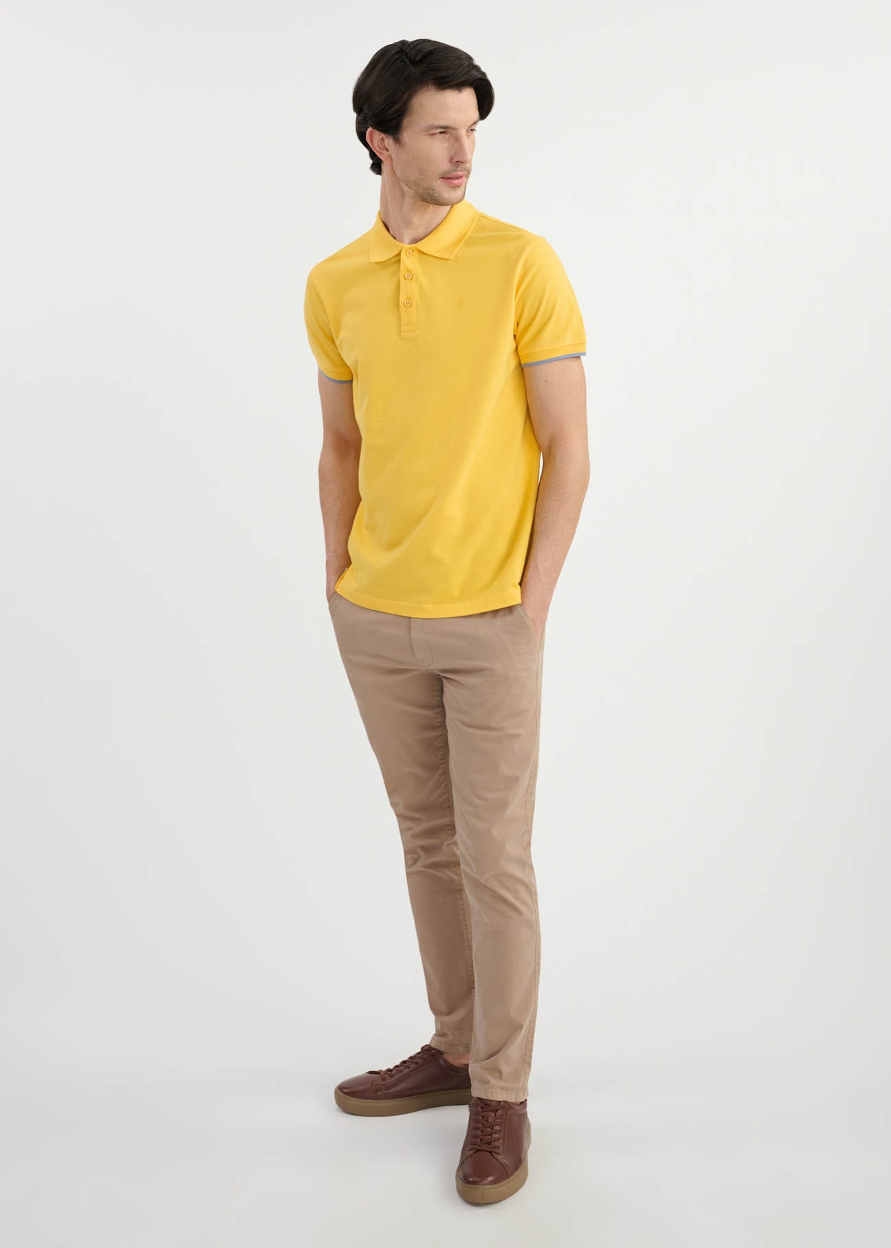 Yellow cotton polo shirt POLMT-0045B-22(W25) - front view on model on white background. Full body visible.