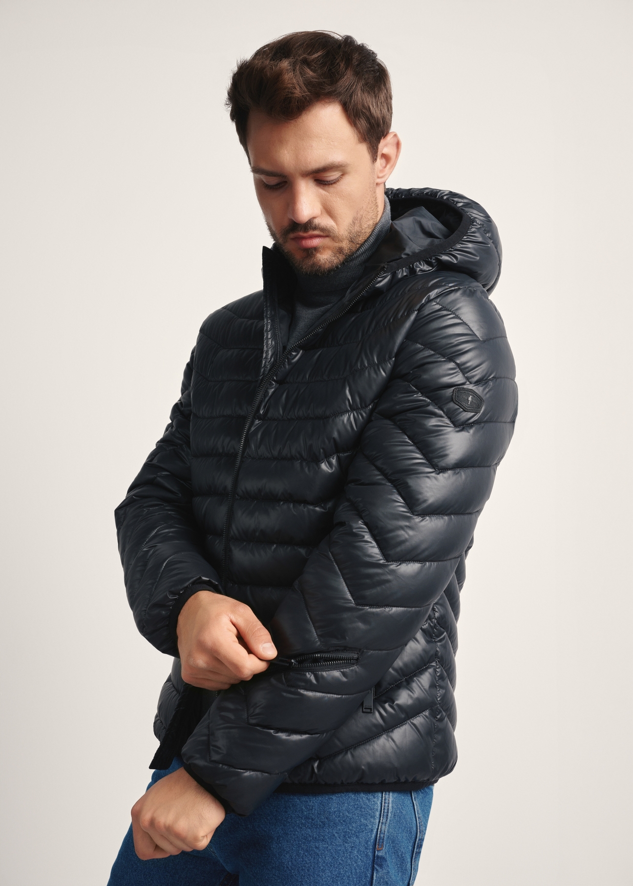 Men's jacket in black KURMT-0380-99(Z25), side view of the product on the model, half of the silhouette visible.