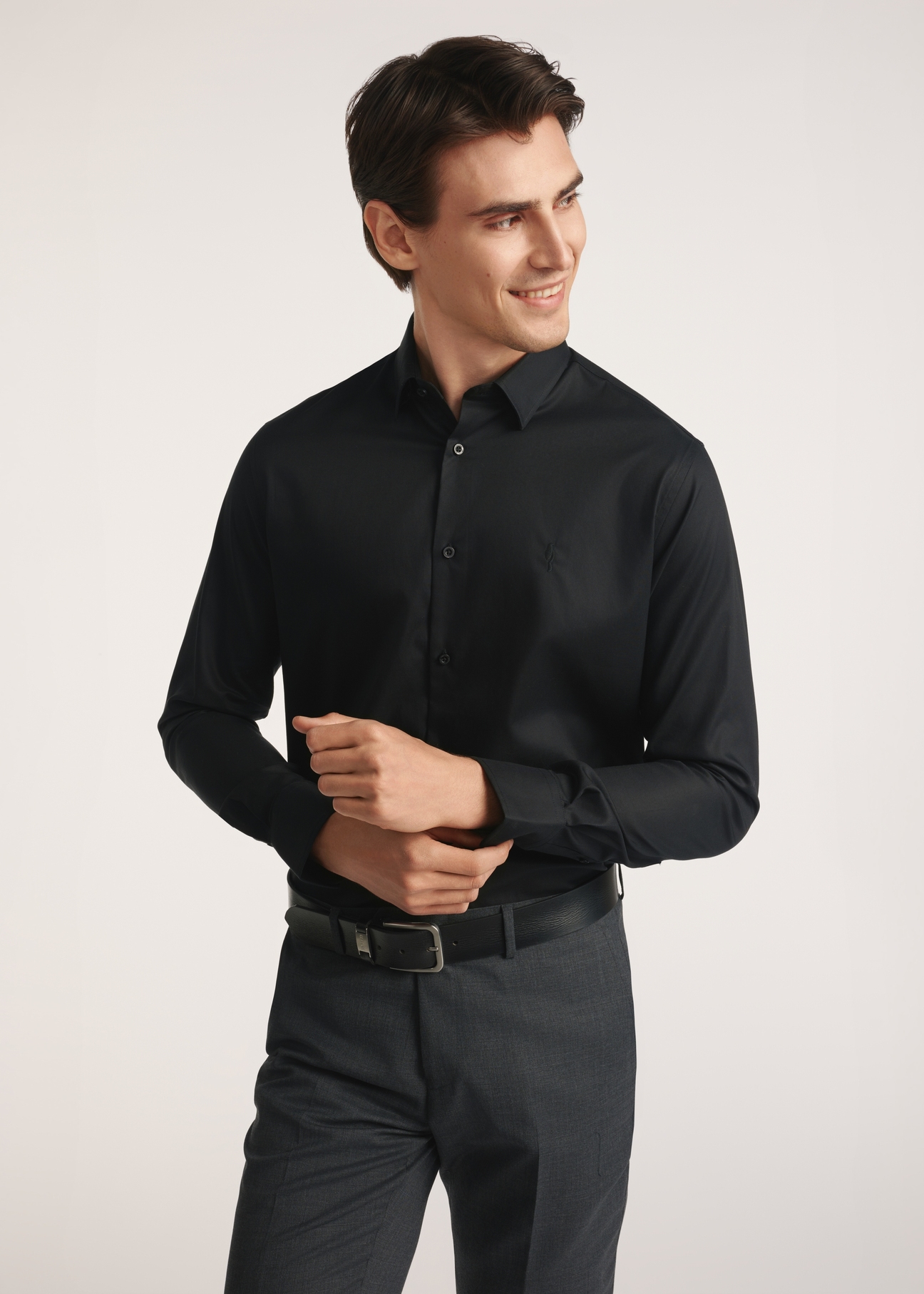 Black men's shirt KOSMT-0351-99(Z25) - front view of the product on a model on a white background. Half of the silhouette visible.