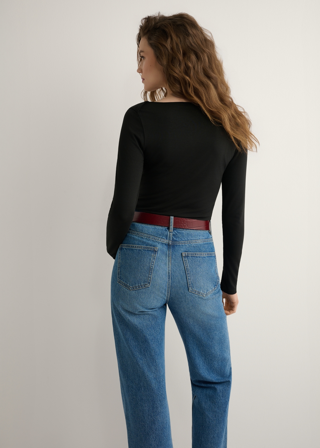 Women's black modal blouse LSLDT-0056-99(W26), back view of the product on the model. Half of the silhouette visible.