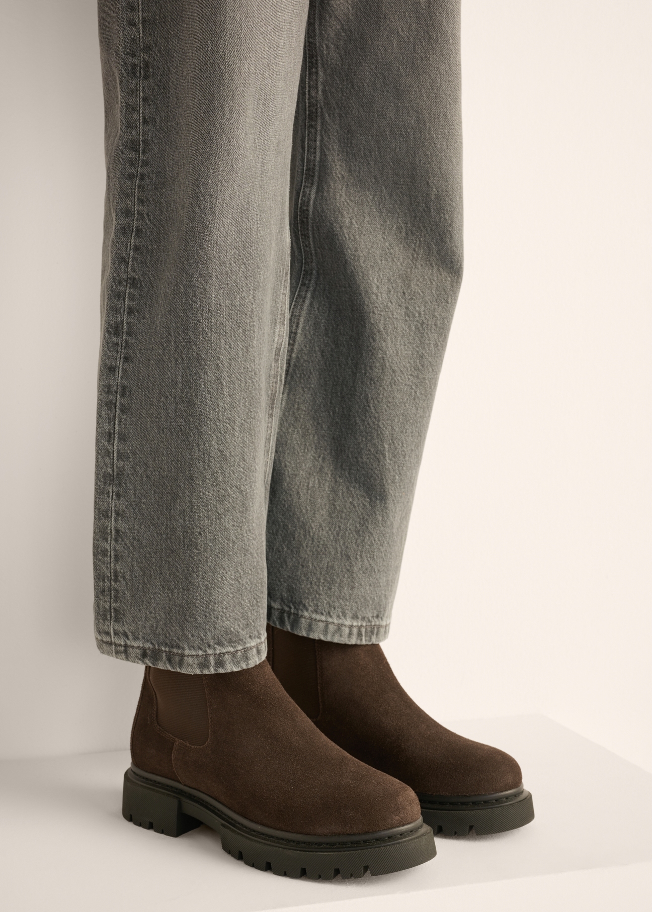 Women's dark brown suede Chelsea boots BUTYD-1093-1I(Z26), side view of the product on the model's feet.