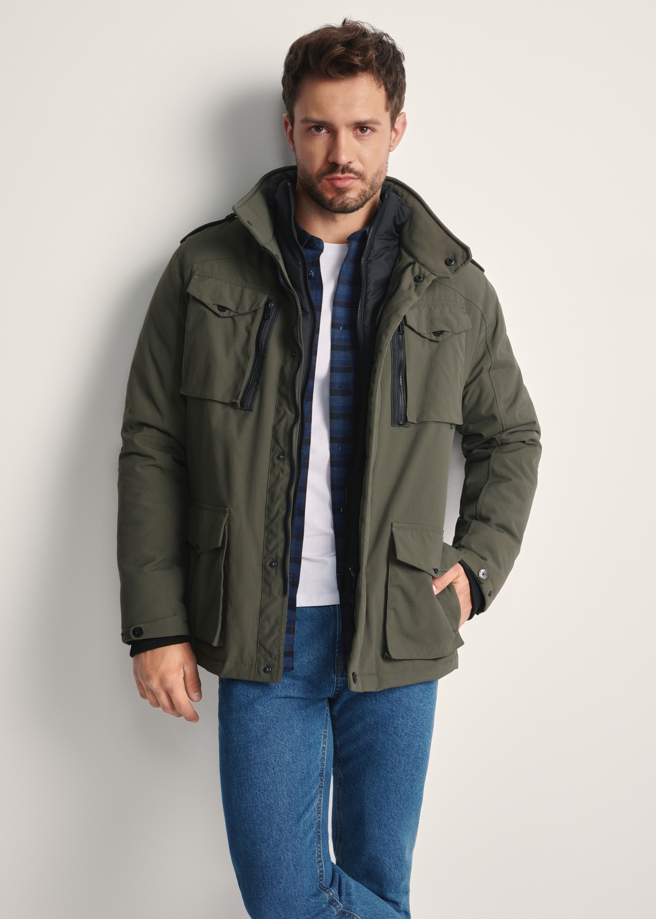 Men's olive transitional jacket KURMT-0392-57(Z25) - front product view of the model against a white background. Half silhouette visible.