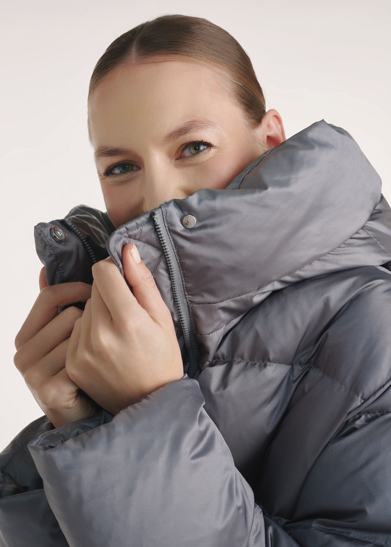 Gray women's down jacket KURDT-0585-91(Z25), close-up of the product on the model.