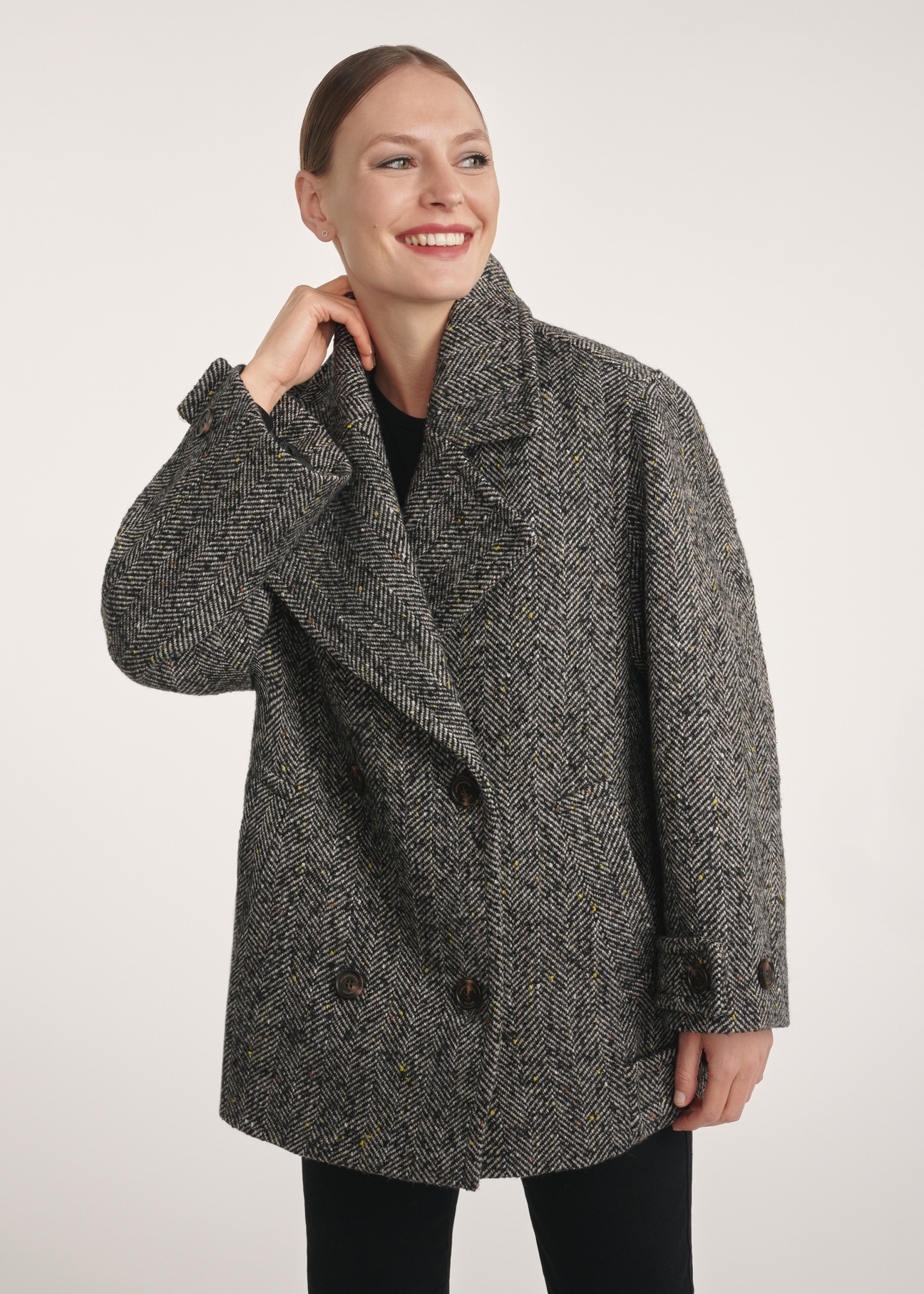 Gray short women's coat PLADT-0062-91(Z25), front view of the product on the model, half of the silhouette visible.-02