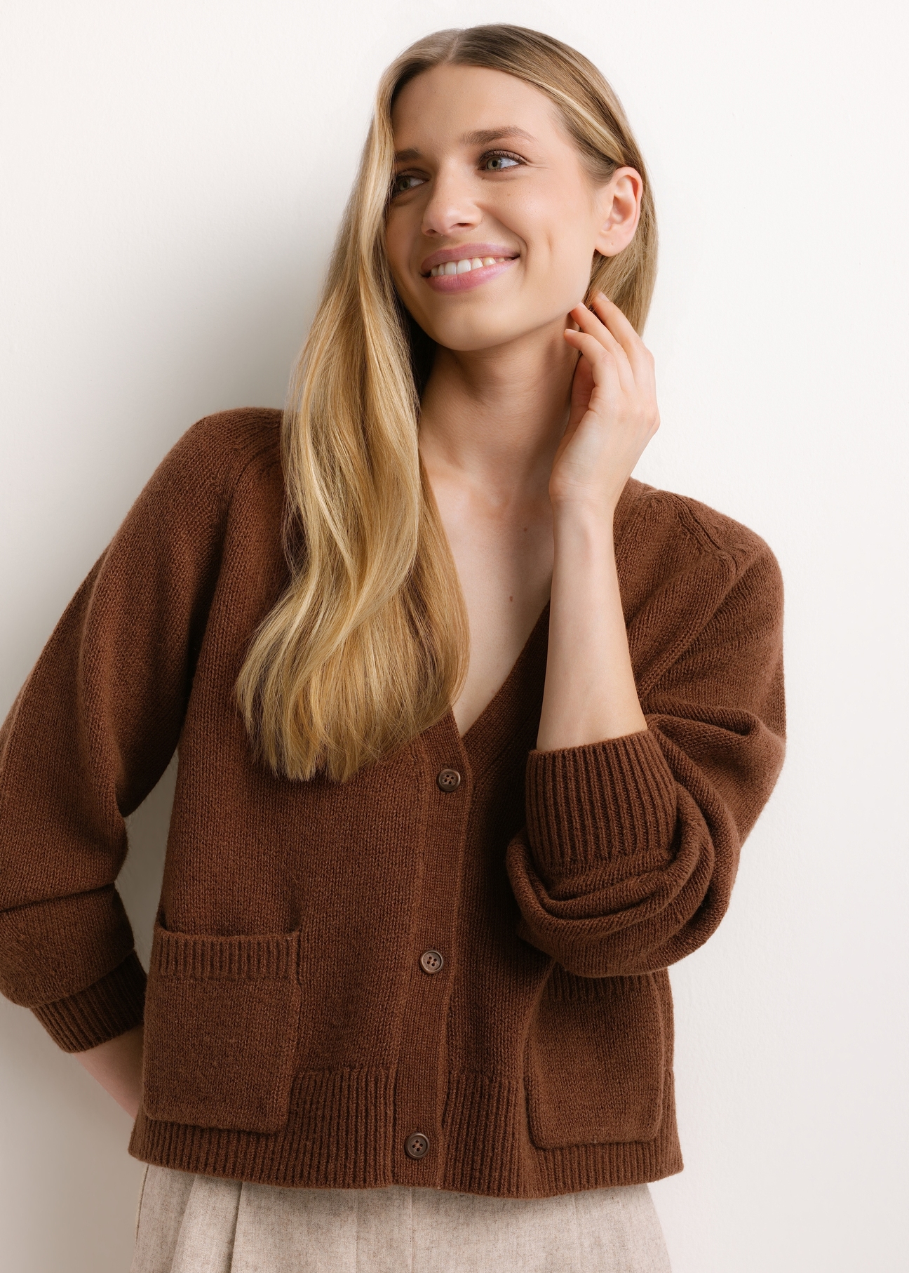 Women's brown wool cardigan KARDT-0071-1H(Z26), front view of the product on the model. Half of the silhouette visible.