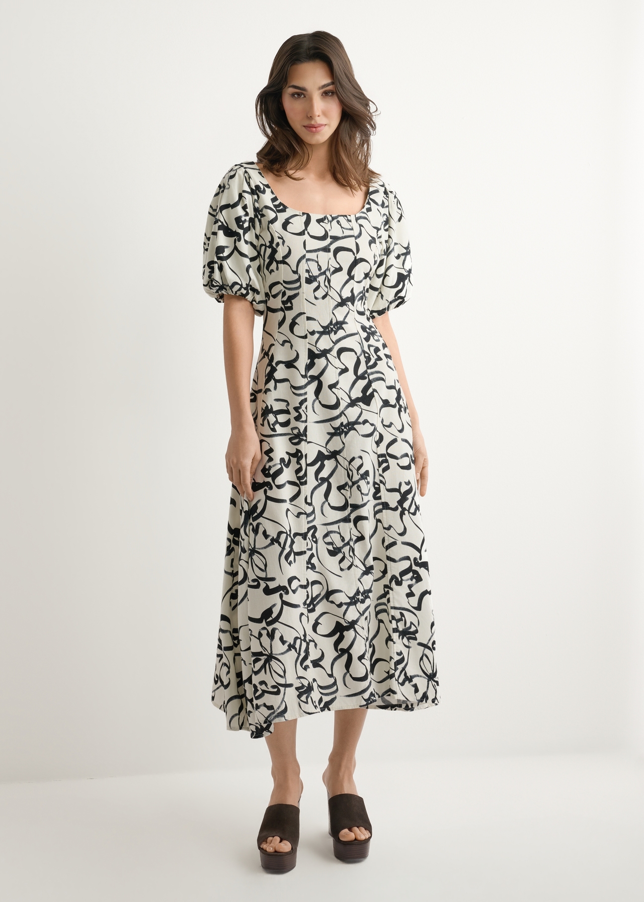 Women's floral dress SUKDT-0277-0P(W26), front view of the product on the model. Full body visible.