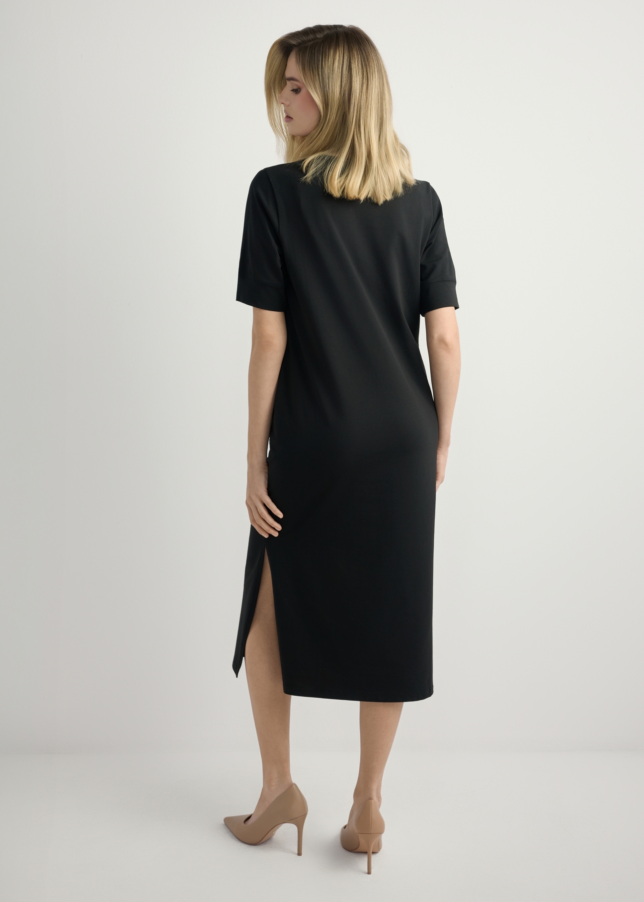 Black cotton midi dress SUKDT-0256-99(W26) - back view of the product, on a model, against a light background. The entire silhouette is visible.