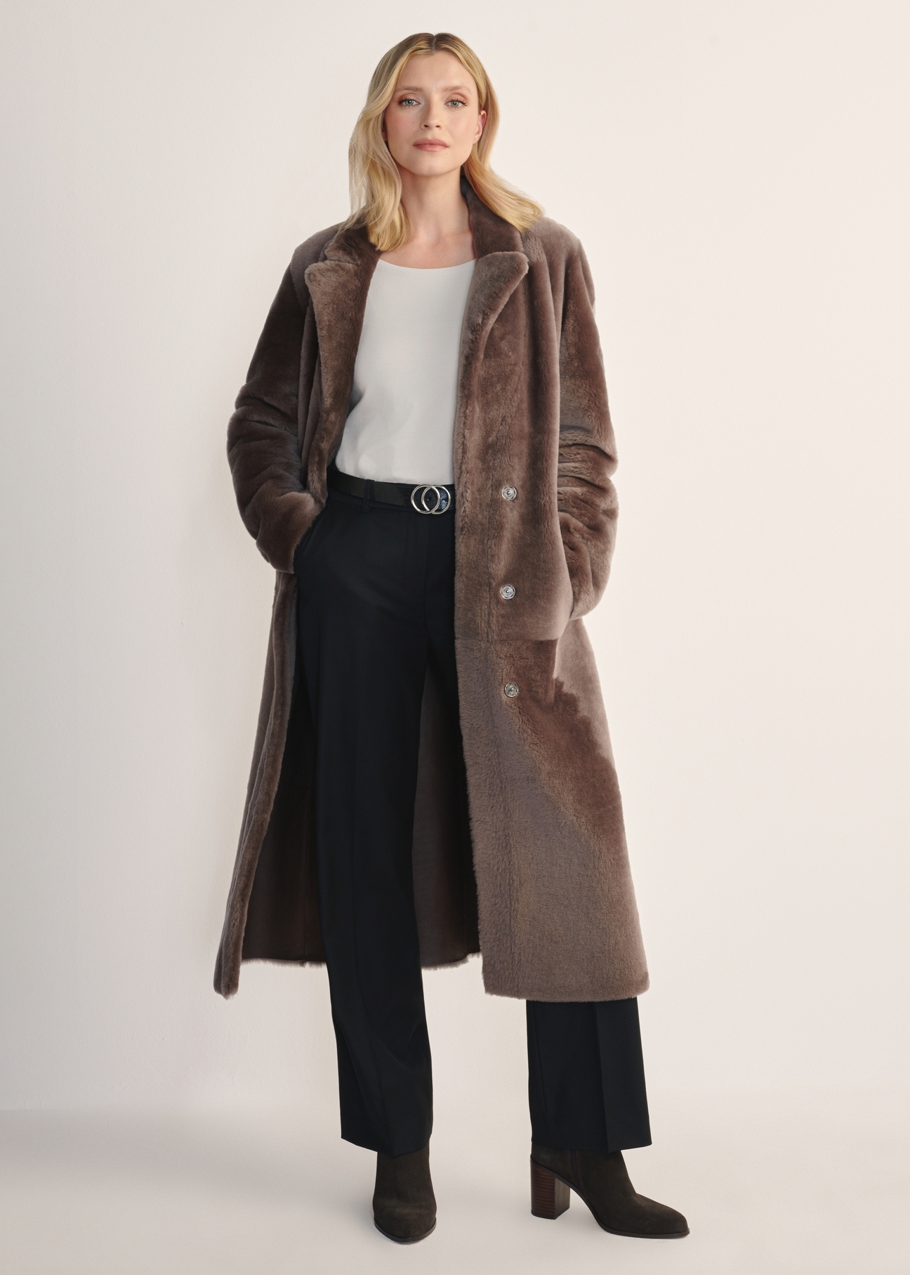 Women's long brown sheepskin coat KOZDS-0086- 3094(Z25) - front view of the product on a model, against a white background. Full body visible.