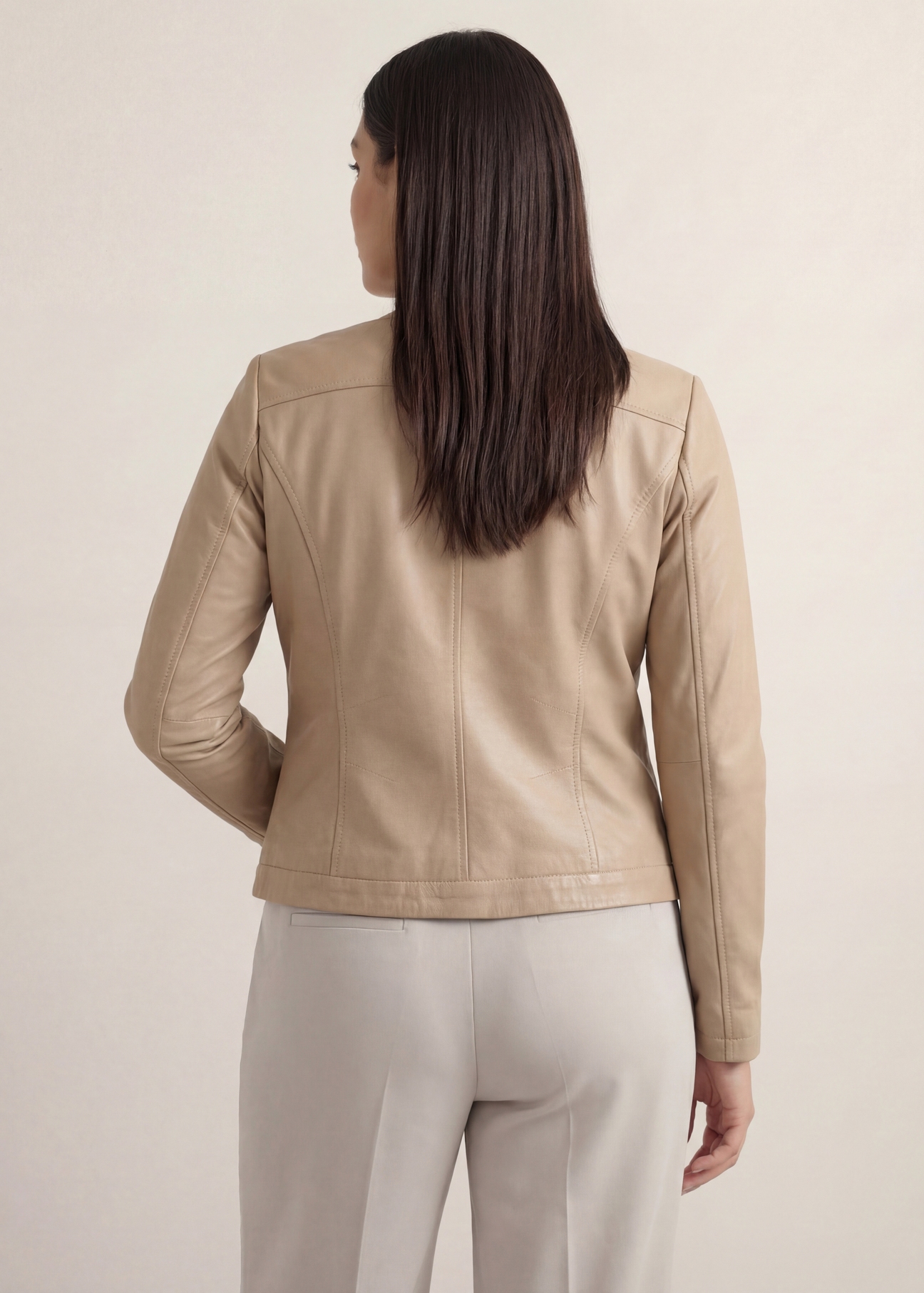 Beige women's leather jacket KURDS-0154 L-1B(W26), product view from the back on the model.
