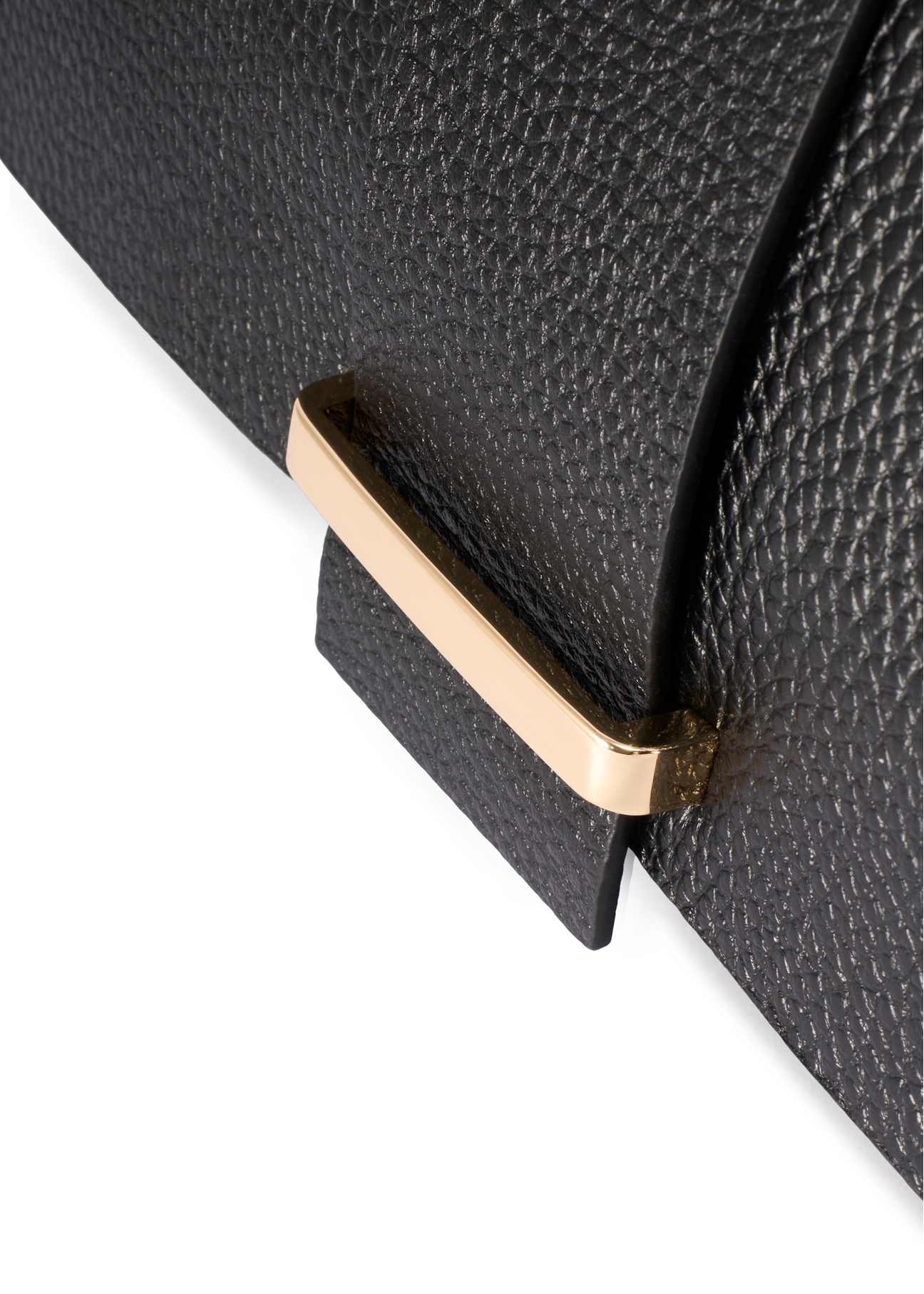 Women's leather handbag in black color TORES-1220-9I(W26) - close-up of detail, on white background.