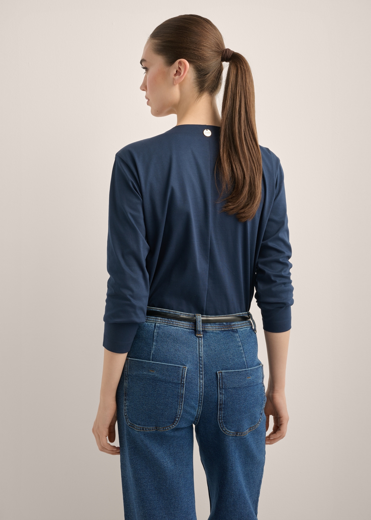 Women's navy blue cotton blouse LSLDT-0060-7E(Z26), product view from the back on the model. Half of the silhouette visible.